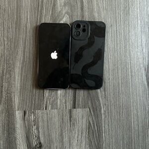 Apple iPhone with Black Snake Pattern Case